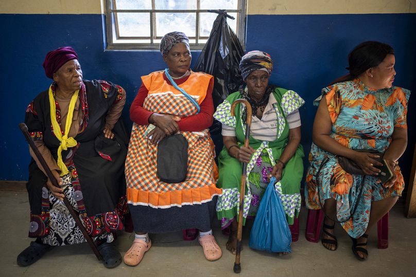 Women wait to cast their ballots on Wednesday May 29, 2024 during general elections in Nkandla, Kwazulu Natal, South Africa.