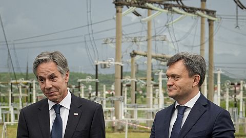 US Secretary of State Blinken talks with Moldova's Prime Minister Recean during a visit to Moldelectrica Chisinau Substation in Braila, May 29, 2024, 
