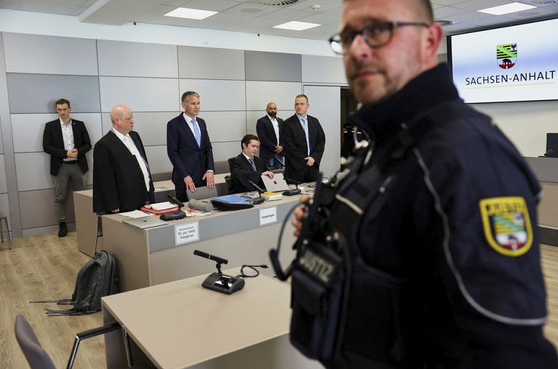 German far-right politician of the Alternative for Germany (AfD) Bjoern Hoecke, centre, attends his trial in the state court in Halle, 18 April 2024