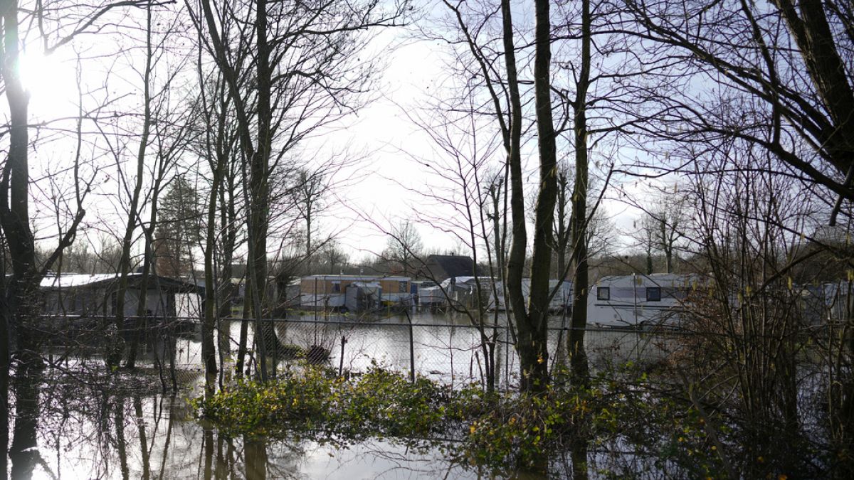 A caravan park is flooded after heavy rains in Geraardsbergen, Belgium, Thursday, Jan. 4, 2024.