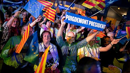 Supporters of exiled Catalonian former regional president Carles Puigdemont at a campaign rally in Argelers, France.