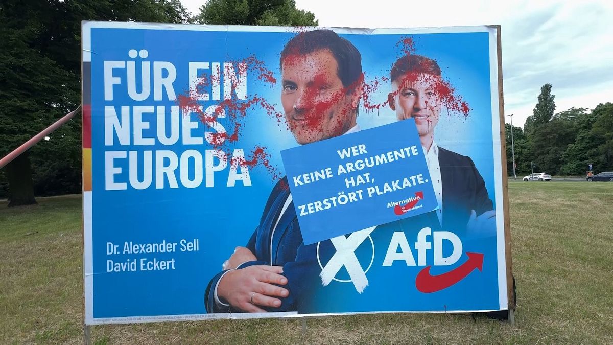Damaged AfD vote poster in Berlin reading (German): "Those who have no arguments destroy posters"