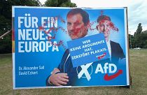 Damaged AfD vote poster in Berlin reading (German): "Those who have no arguments destroy posters"