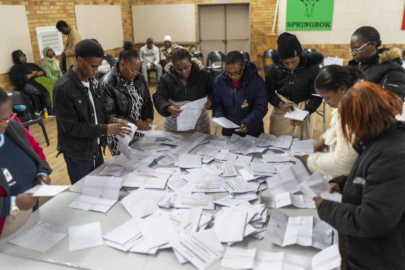 Election volunteers count ballots at Craighall Park Elementary school in Johannesburg, South Africa, Wednesday May 29, 2024.