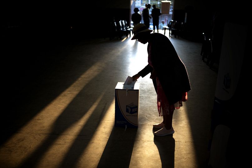 A woman casts her ballot at a polling station, during general elections in Eshowe, South Africa, Wednesday May 29, 2024. 