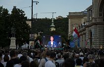 People listen to the speech of Peter Magyar during the debate in Budapest, Thursday May 30, 2024, ahead of the European Parliament elections,