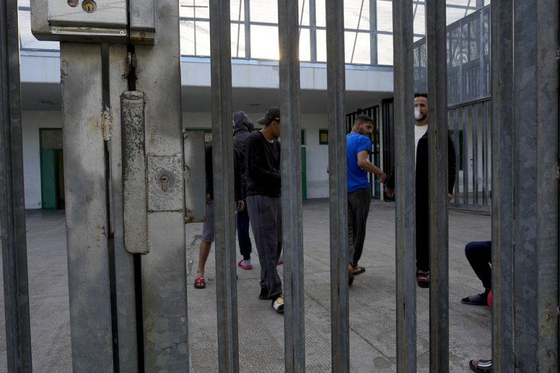 Detainees gather in an open area of the Ponte Galeria center, one of the facilities created in Italy to hold migrants ahead of their repatriation, in Rome, March 19, 2024.