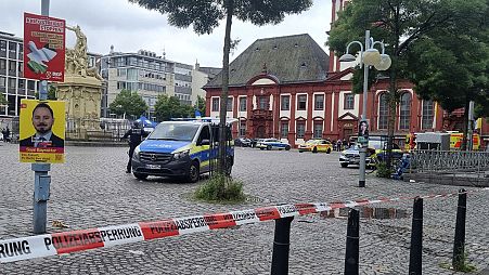 The area is cordoned off as police and firefighters are deployed following an incident on Mannheim's market square, Germany, Friday, May 31, 2024.