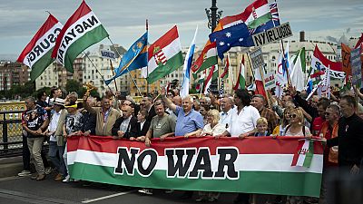 People march during a rally in support of Hungary's Prime Minister Viktor Orbán and his party in Budapest, Hungary on Saturday, June 1, 2024. (AP Photo/Denes Erdos)