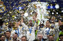 Real Madrid's players celebrate with the trophy after winning the Champions League final at Wembley, June 1, 2024