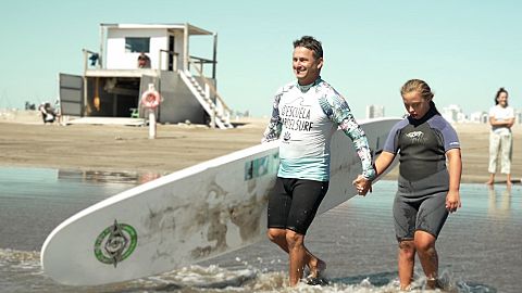 Watch: Pro-surfer paves the way for disabled students to catch waves in Argentina