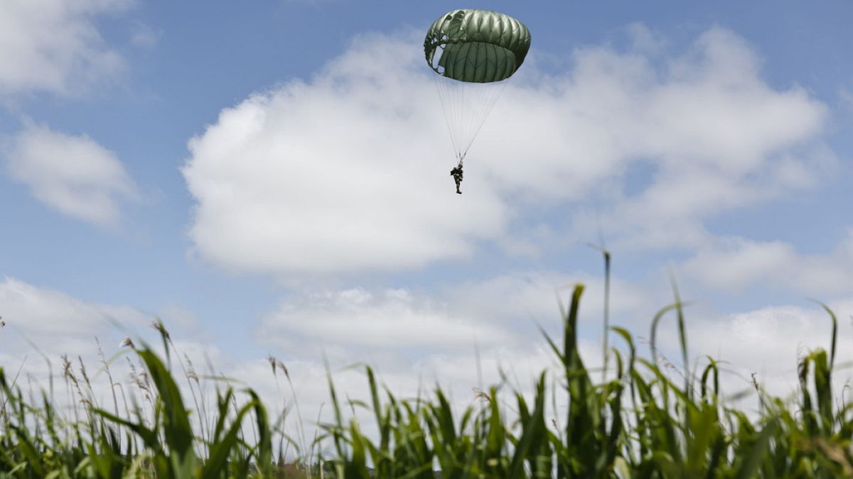 Parachute drop in Carentan-Les-Marais in Normandy, France on Sunday ahead of D-Day 80th anniversary commemorations