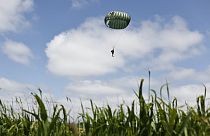 Parachute drop in Carentan-Les-Marais in Normandy, France on Sunday ahead of D-Day 80th anniversary commemorations