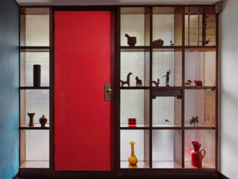 Natural light emanates throughout the lower level from glass around the front door