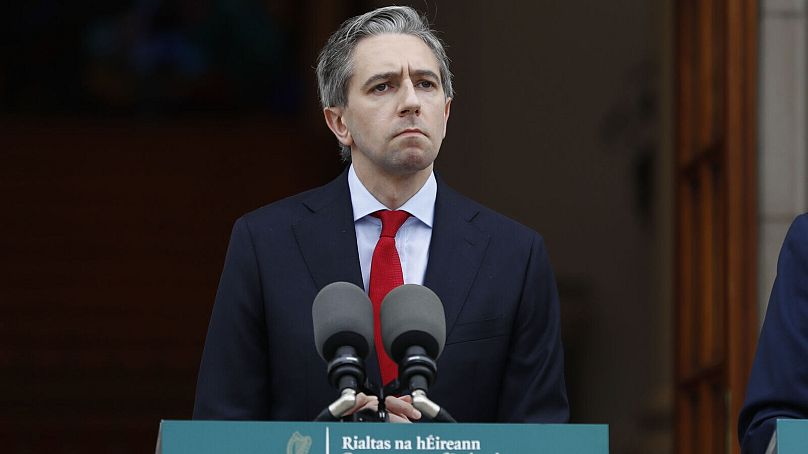 Ireland's Prime Minister Simon Harris speaks to the media during a press conference outside the Government Buildings, in Dublin, Ireland, Wednesday May 22, 2024.