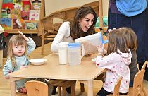 Britain's Kate, the Duchess of Cambridge reacts with children, during a visit to LEYF or London Early Years Foundation, at Stockwell Gardens Nursery and Pre-School in south Lo