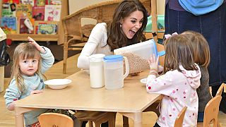 Britain's Kate, the Duchess of Cambridge reacts with children, during a visit to LEYF or London Early Years Foundation, at Stockwell Gardens Nursery and Pre-School in south Lo