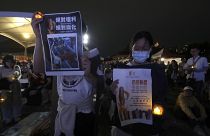 Participantes en una vigilia en Taiwán con motivo del 35 aniversario de las masacres de la plaza de Tiananmen (4 de junio de 2024)