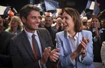Valerie Hayer of the presidential Renew party and candidate for the upcoming European elections, right, and French Prime Minister Gabriel Attal attend a political rally.