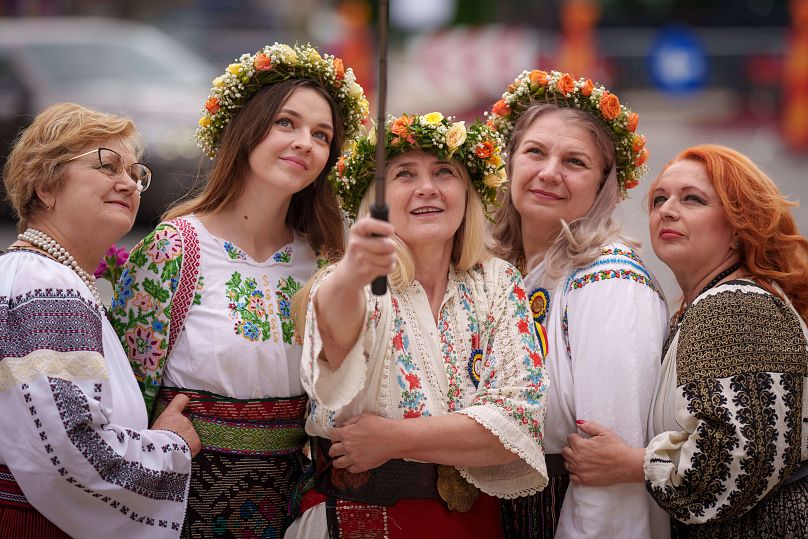 Women wearing Romanian traditional blouses, known in Romanian as an "IE" 