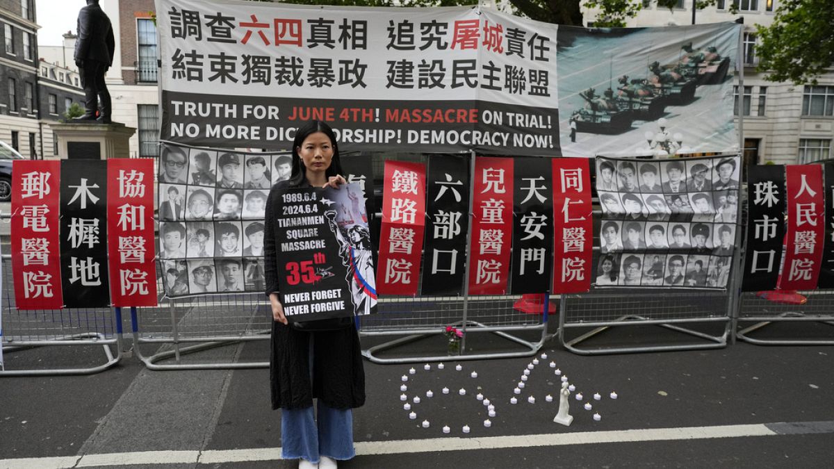 A demonstrator in London at a candlelight vigil to commemorate the 35th anniversary of the 1989 Tiananmen Square massacre