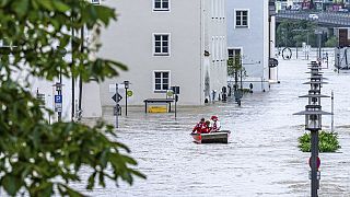 A lifeboat navigates through the flood waters of the Danube in the old town of Passau, Germany, Tuesday June 4, 2024.
