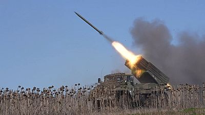 A rocket is fired from the Russian army's missile system toward Ukrainian position at an undisclosed location. 