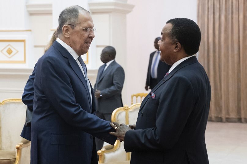 Russian Foreign Minister Sergey Lavrov and Republic of Congo's President Denis Sassou N'Guesso shake hands during their meeting in Oyo, Republic of Congo, June 2024.