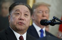 Broadcom CEO Hock Tan speaks as President Donald Trump listens during an event on Nov. 2, 2017 in Washington. 