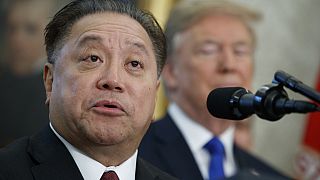 Broadcom CEO Hock Tan speaks as President Donald Trump listens during an event on Nov. 2, 2017 in Washington. 