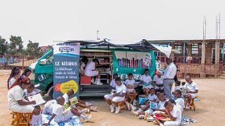 A mobile library helps boost literacy among pupils in the DR Congo