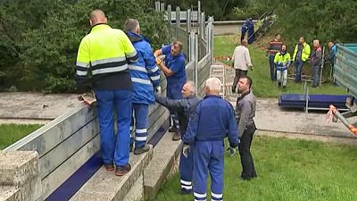 The banks of the Danube river are secured as flooding threatens Bratislava