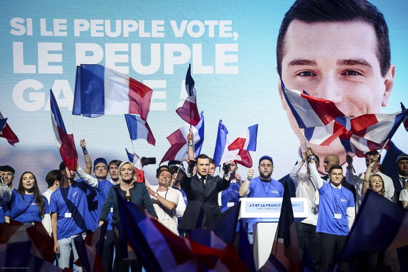 French far-right National Rally's Marine Le Pen and lead candidate Jordan Bardella during a political meeting in Paris, May 2024