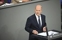 German Chancellor Olaf Scholz speaks during a Bundestag German Parliament session in Berlin Thursday, June 6, 2024.