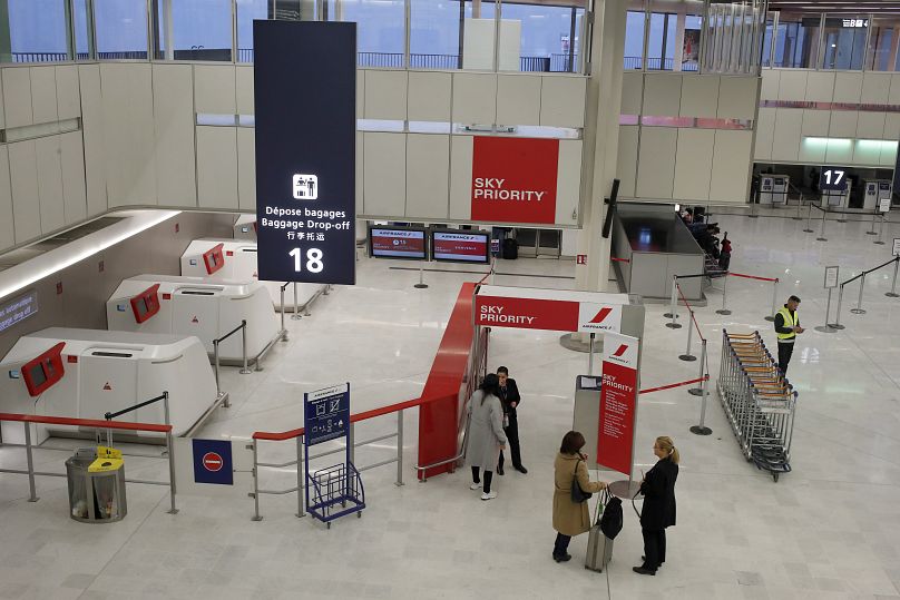 An empty baggage drop-off desk at Paris Orly airport, France.