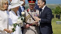  French President's wife Brigitte Macron, Britain's Queen Camilla, BritainKing Charles III and French President Emmanuel Macron discuss during the 80th D-Day anniversary