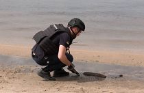 Ukrainian deminer finds bomb on Dnipro river bank