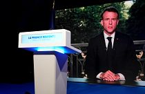 Annonce d'Emmanuel Macron diffusée au QG du RN à Paris, France, dimanche 9 juin 2024.