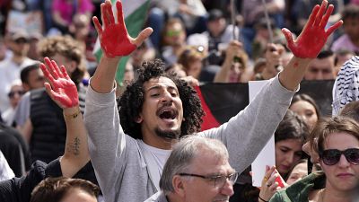 Pro-Palestinian protesters demonstrate against Germany's Israel policy during an SPD rally in Duisburg, June 8, 2024