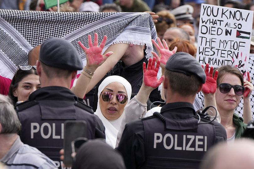 Pro-Palestinian protesters demonstrate against Germany's Israel policy at an SPD rally in Duisburg, June 8, 2024