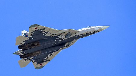FILE - In this file photo taken on Wednesday, May 9, 2018, a Russian Air Force Sukhoi Su-57 jet flies over Red Square