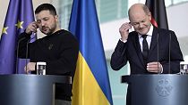 German Chancellor Olaf Scholz, right, and Ukrainian President Volodymyr Zelenskyy attend a press conference in the chancellory in Berlin, Friday, Feb.16, 2024.