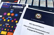 Pages from the U.S. State Department's Global Engagement Center report released on Aug. 5, 2020, are seen in this photo.