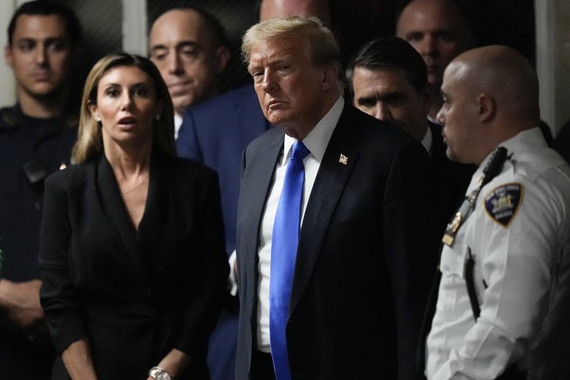 Donald Trump walks out of the courtroom after a jury convicted him of felony crimes for falsifying business records in a scheme to illegally influence the 2016 election