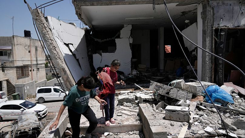 منزل دمر خلال غارة شنتها القوات الإسرائيلية في قرية كفر دان، بالقرب من مدينة جنين بالضفة الغربية، الأربعاء، 12 يونيو، 2024.