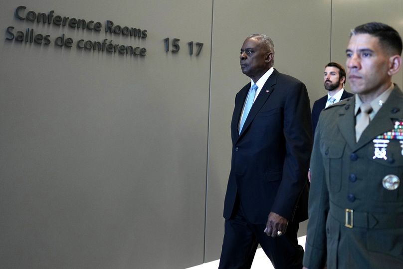 US Secretary of Defence Lloyd Austin, left, arrives for a bilateral meeting on the sidelines of a NATO defence ministers meeting at NATO headquarters in Brussels.