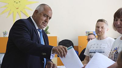 Bulgarian former Prime Minister Boyko Borissov casts his vote at a polling station in Bankya, Sunday, June 9, 2024. 