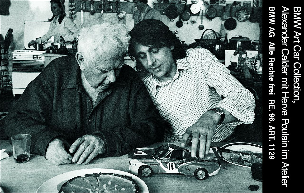 Alexander Calder with Herve Poulain in the studio
