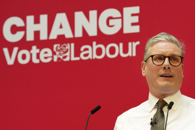 Britain's Labour Party leader Keir Starmer speaks on stage at the launch of The Labour party's 2024 general election manifesto.