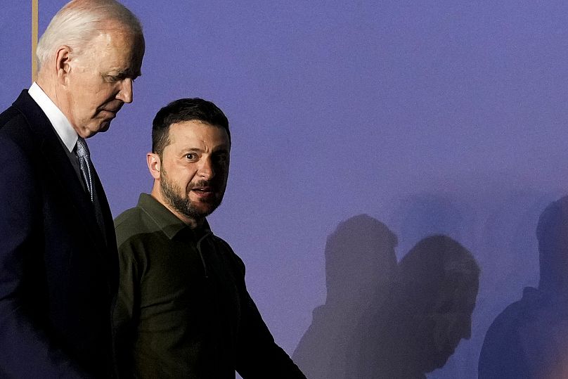 US President Joe Biden Ukraine's President Volodymyr Zelenskyy leave after they signed a bilateral security agreement during the G7 summit, June 13, 2024